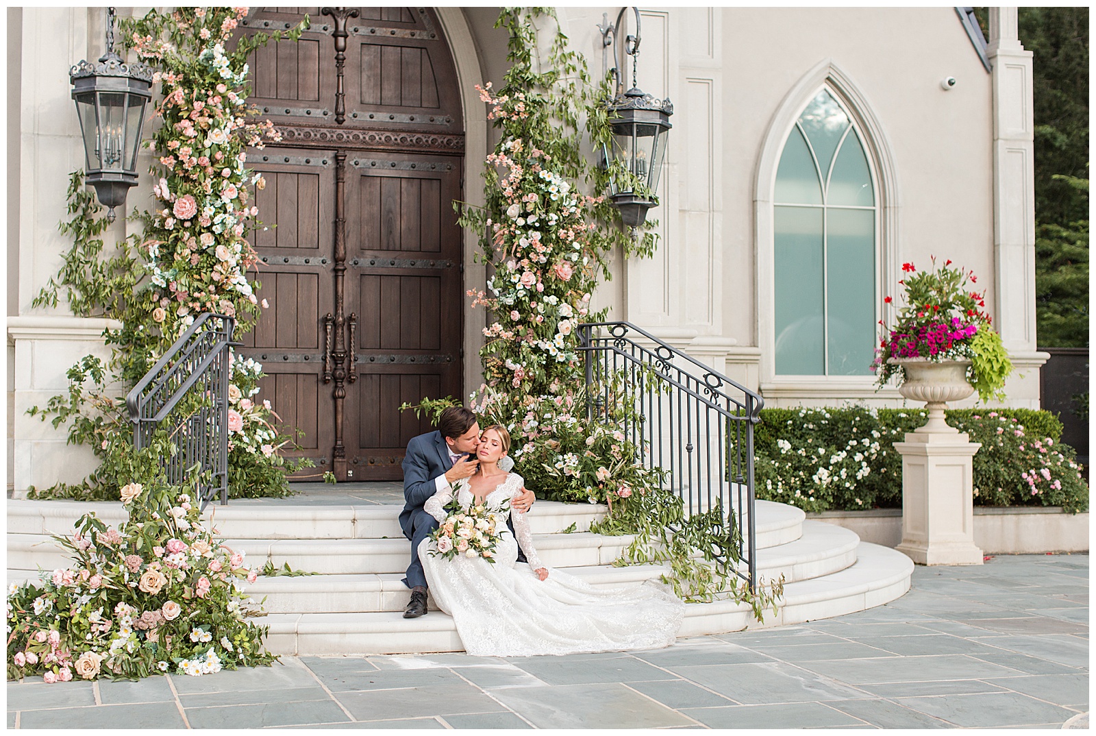 Couple kisses on stairs at romantic and timeless Park Chateau wedding 