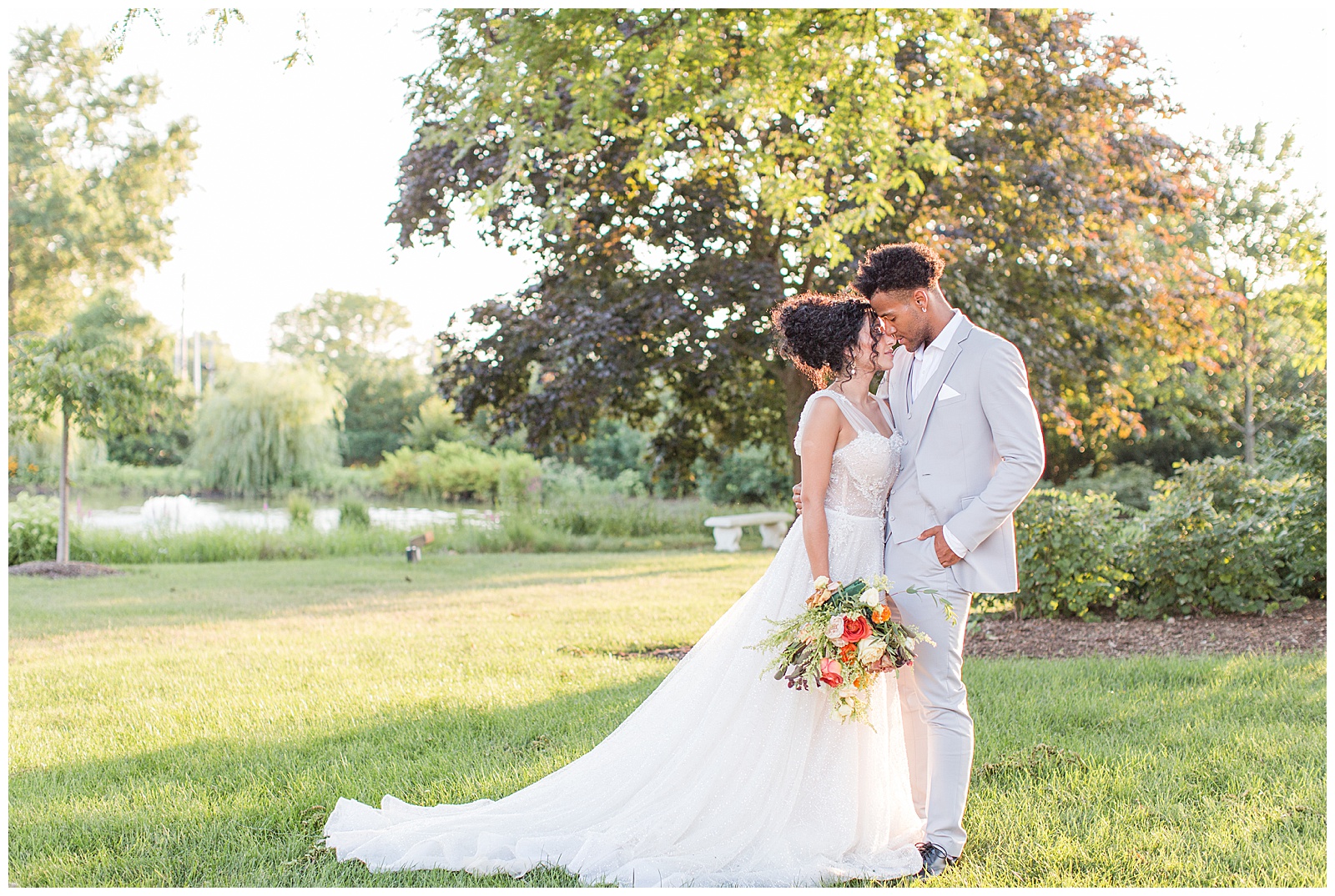 Bright Spring wedding at Park Chateau in South Jersey. Hair and Makeup by Sun Kissed and Made up. Dress by Solutions Bridal. Grooms attire by Generation tux. Florals by Copper and Sage Collective.