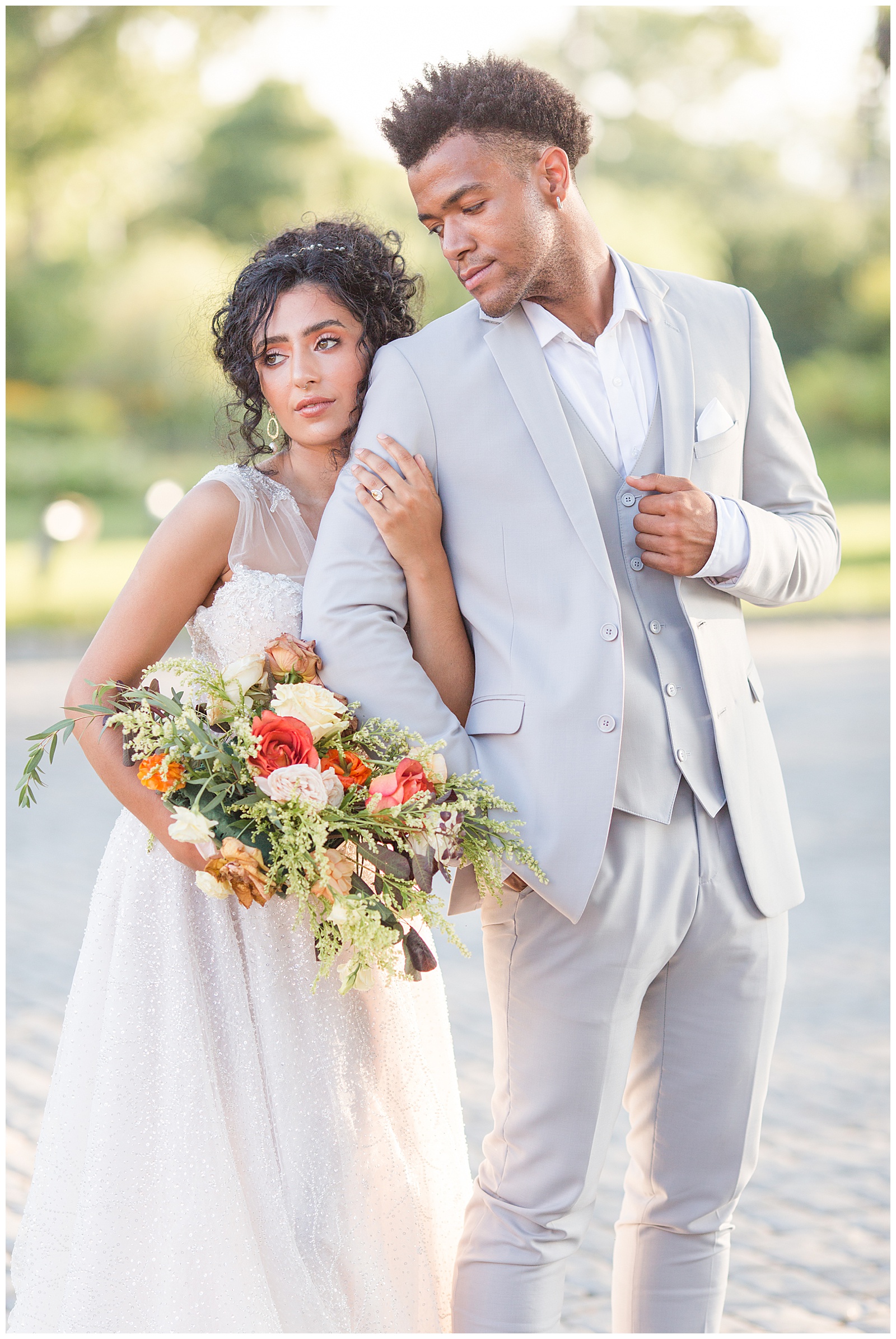 Bright Spring wedding at Park Chateau in South Jersey. Hair and Makeup by Sun Kissed and Made up. Dress by Solutions Bridal. Grooms attire by Generation tux. Florals by Copper and Sage Collective.