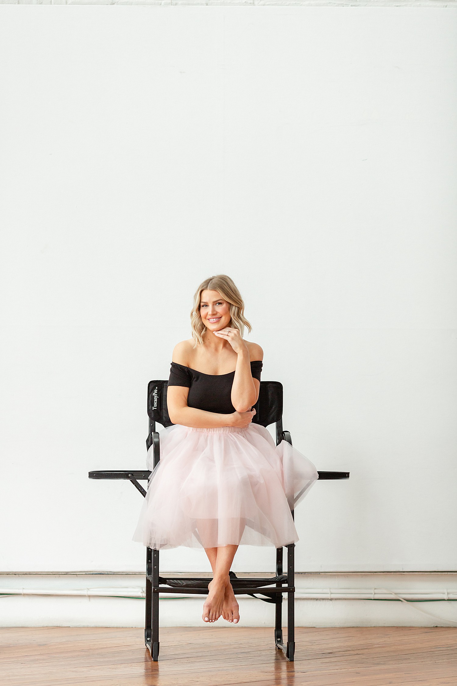Female CEO poses in pink tutu during branding photos by Jocelyn Cruz photography