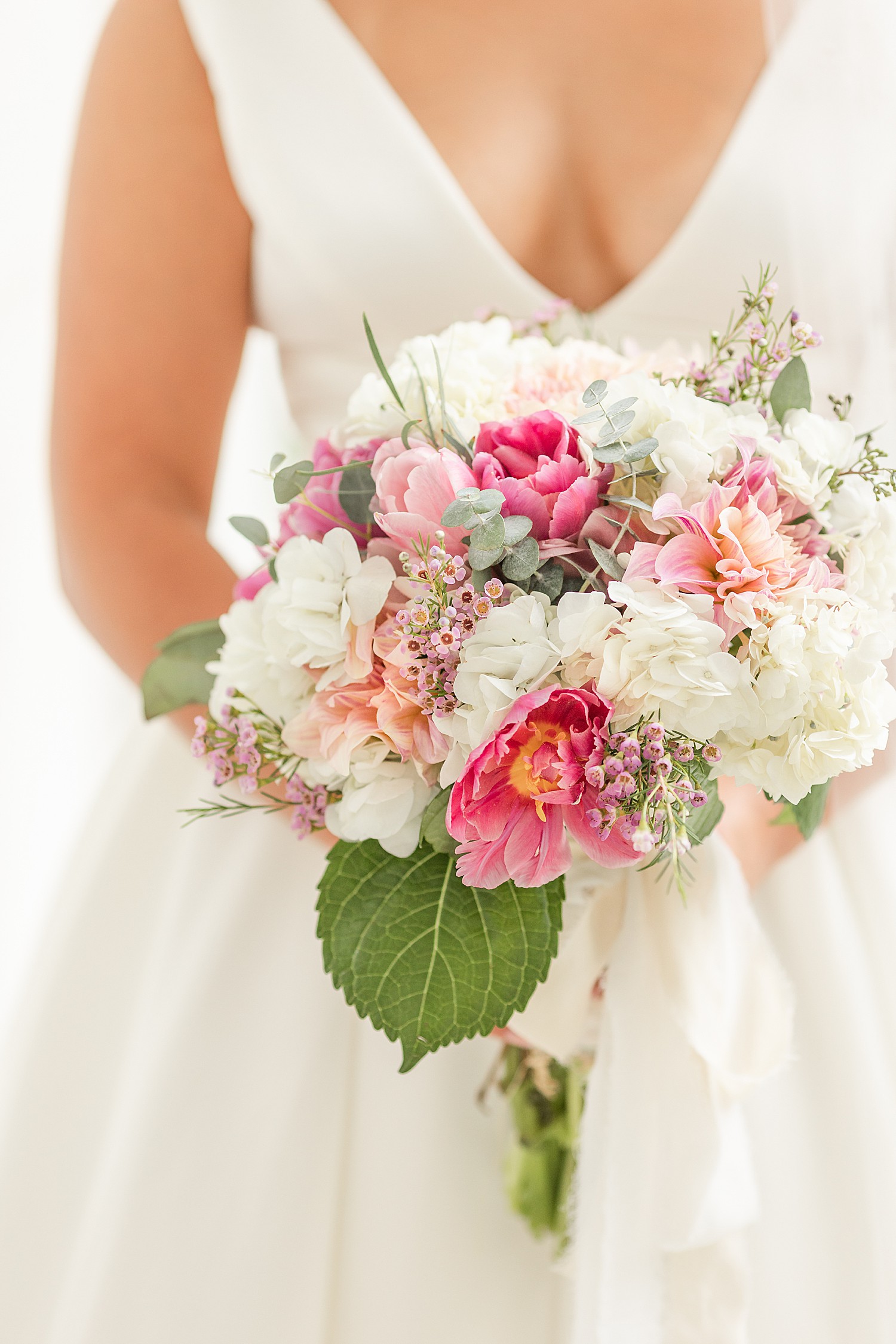 bride's white and pink wedding bouquet