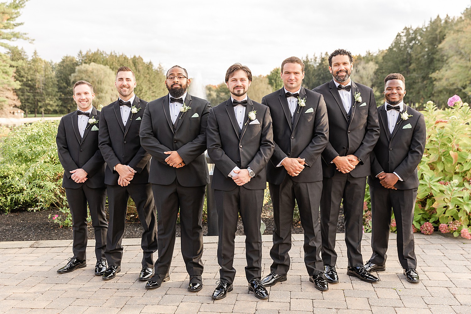 groomsmen and groom portraits at Windows on the Water at Frogbridge 