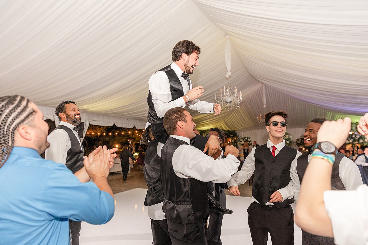 groomsmen having fun during Nj wedding reception