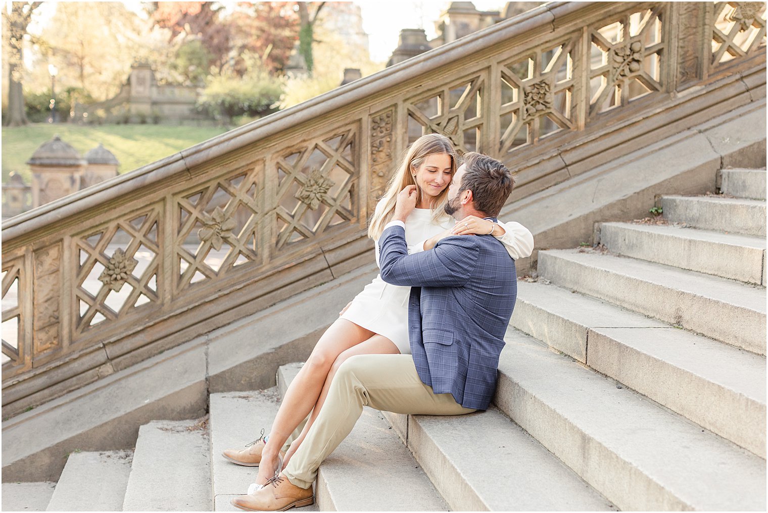 candid moment of couple sitting on stairs together in NYC