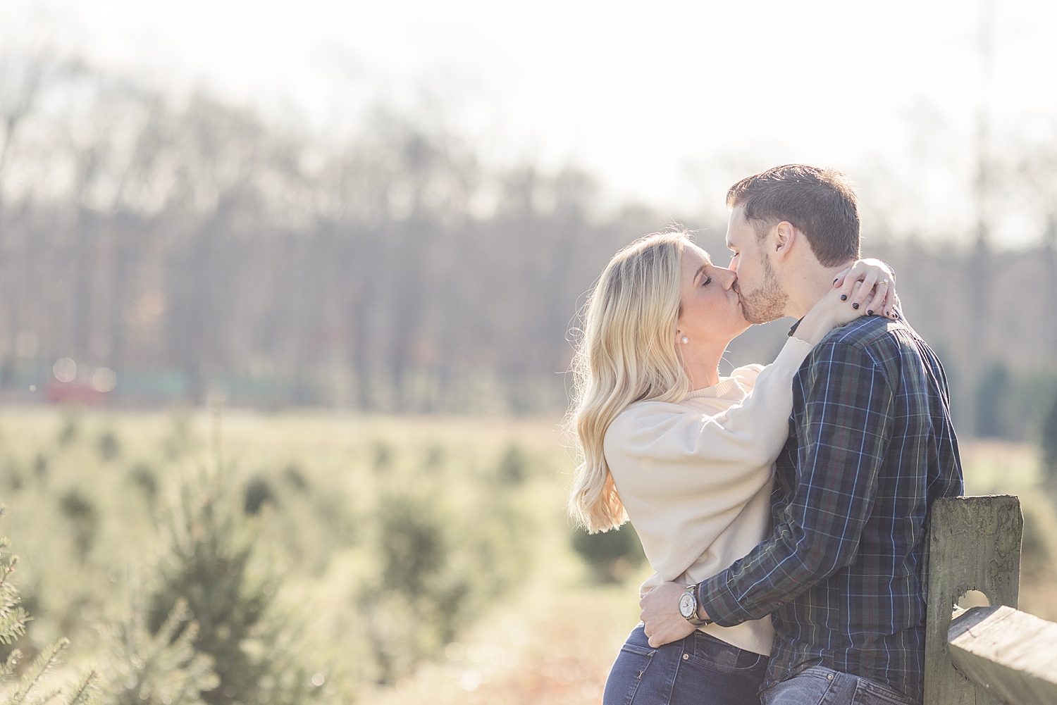 engaged couple kiss during engagement session