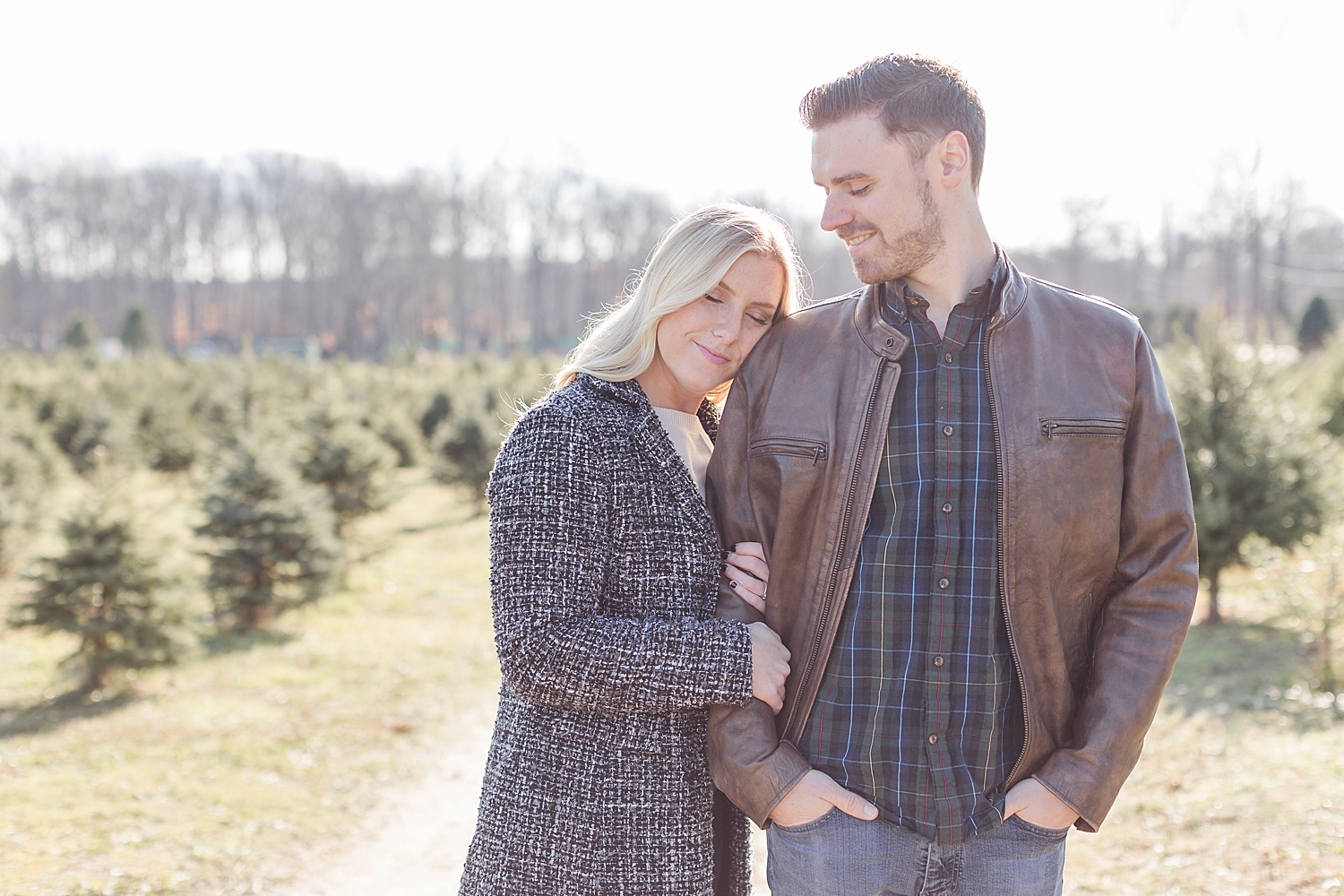 woman leans her head on man's shoulder 