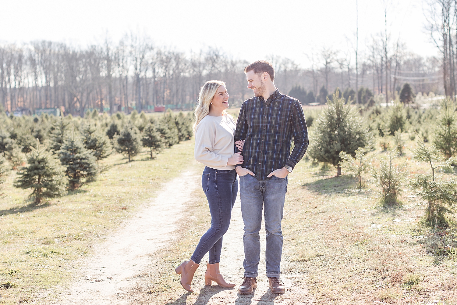 festive engagement session at Christmas tree farm