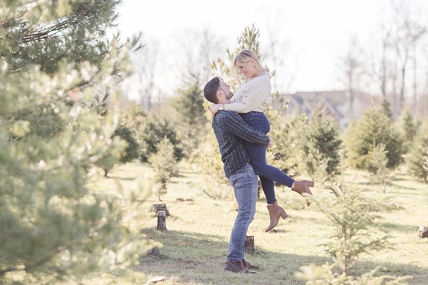 romantic engagement photos at Christmas tree farm 