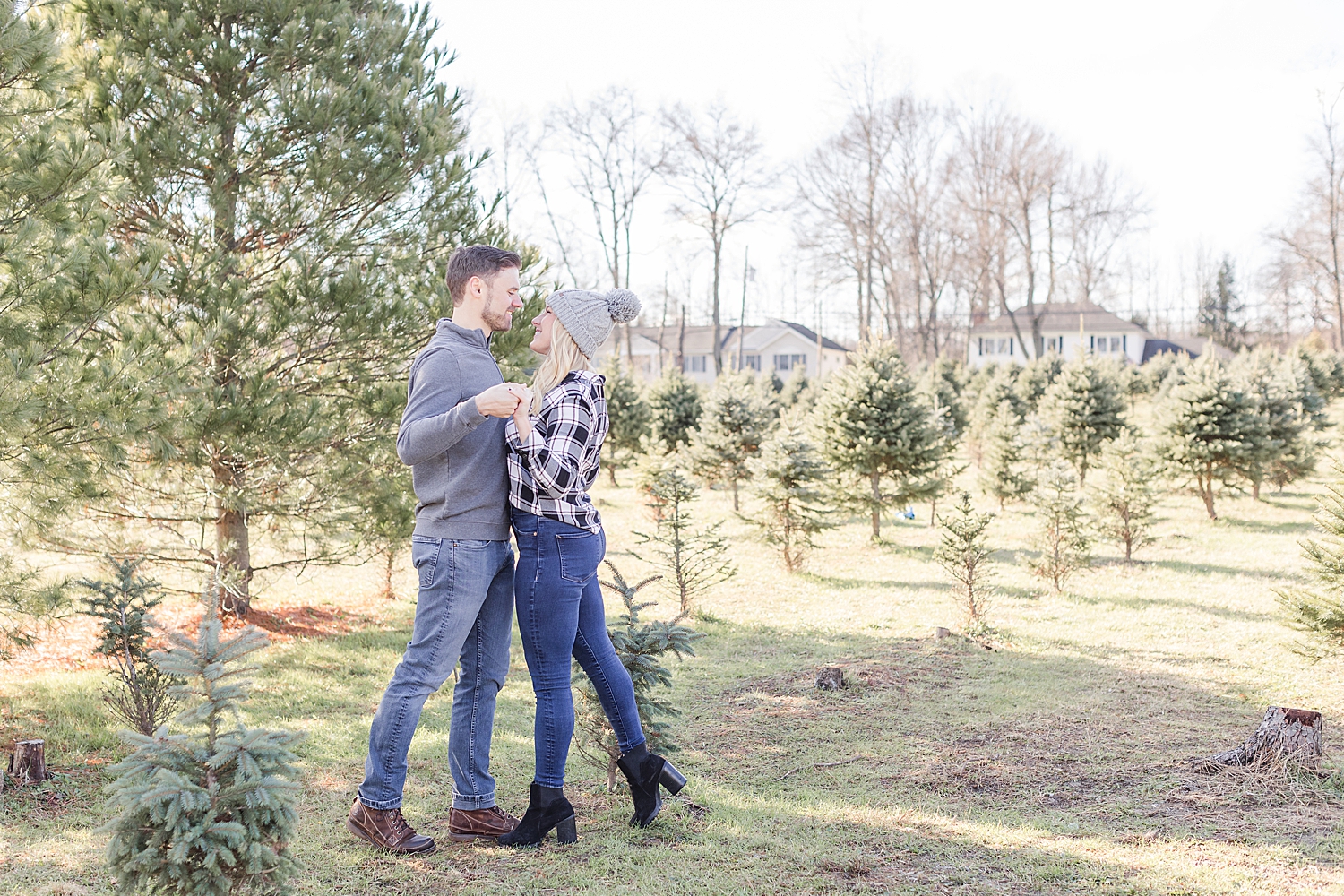 romantic engagement session at Christmas tree farm 