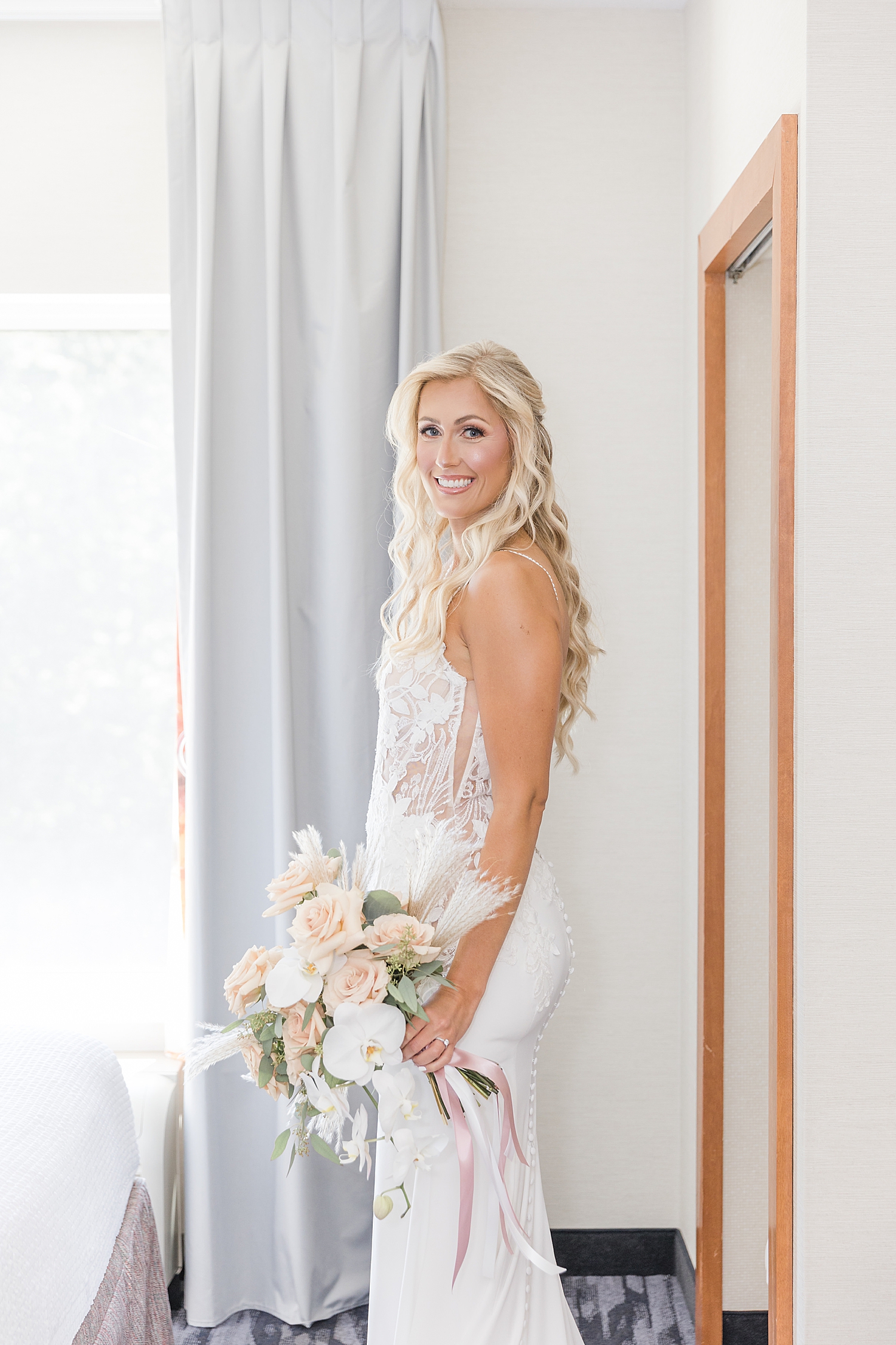 bride with muted bridal bouquet for Boho Inspired Summer Wedding 