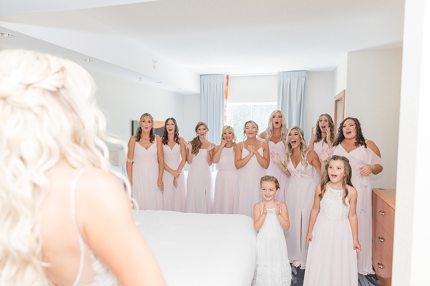 bridesmaids react to seeing bride