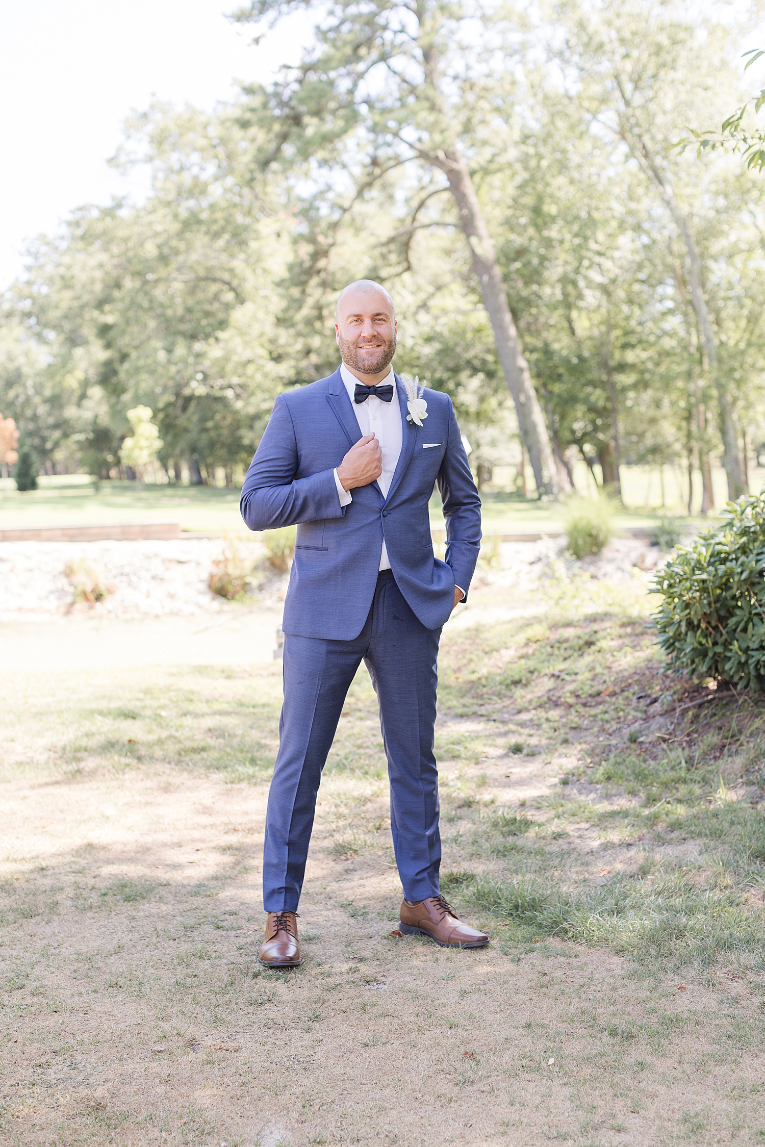 groom portraits outside at Eastlyn Golf Course