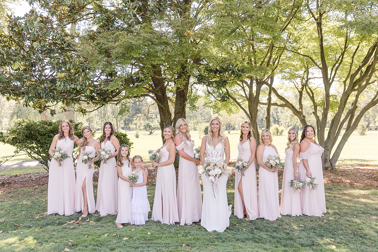 bridesmaids surround bride