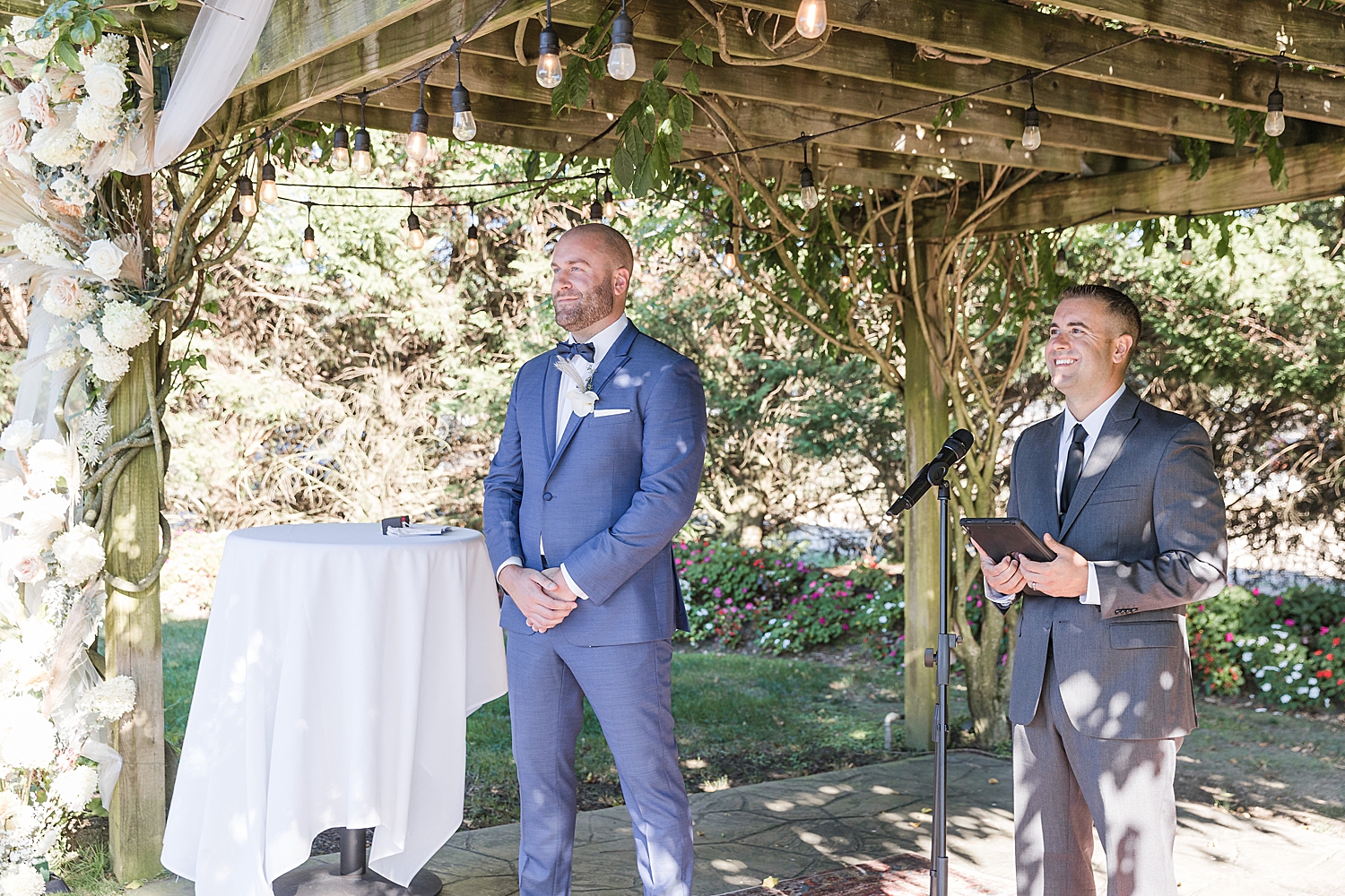 groom waits for bride at wedding ceremony