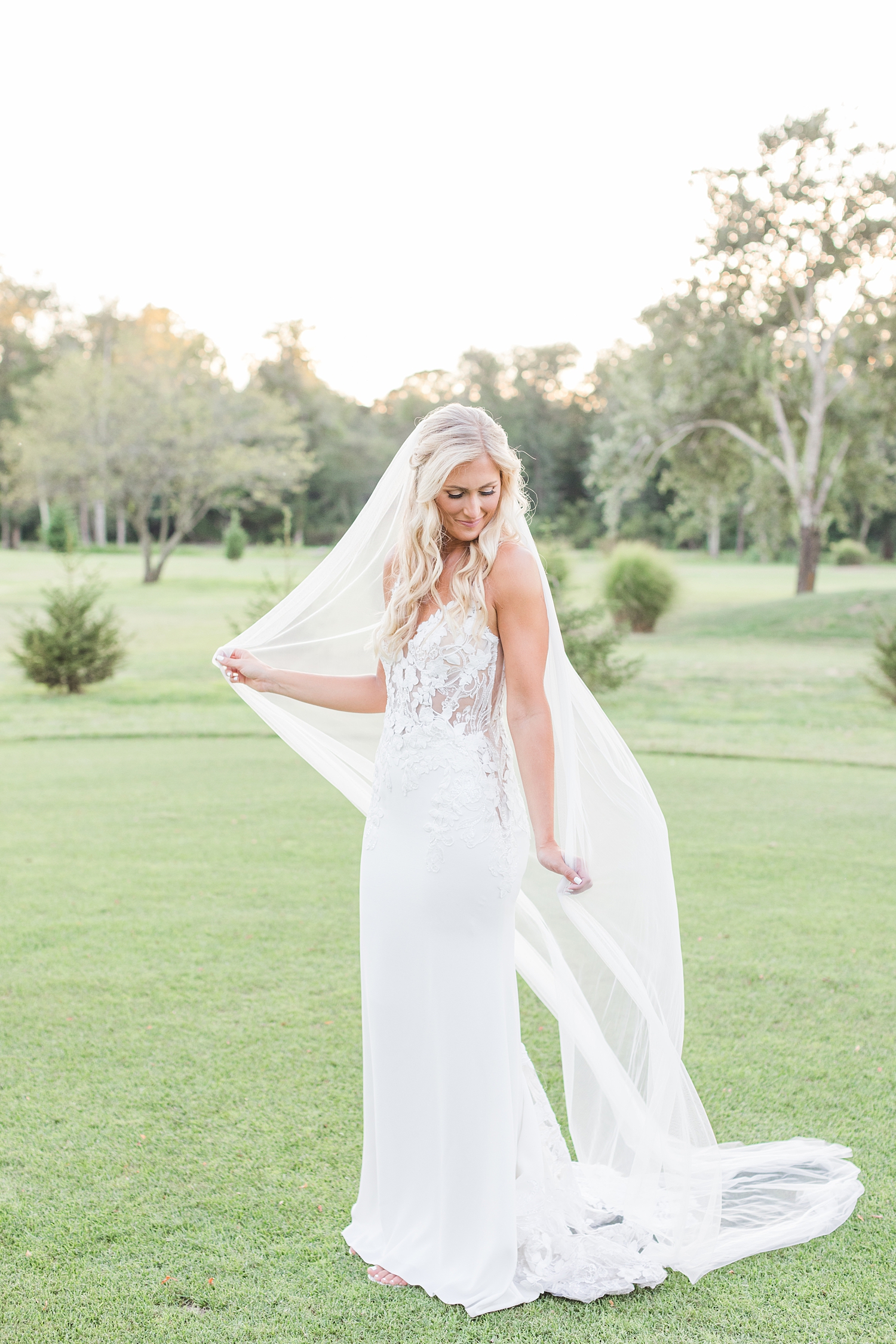 bride on greens of golf course during golden hour