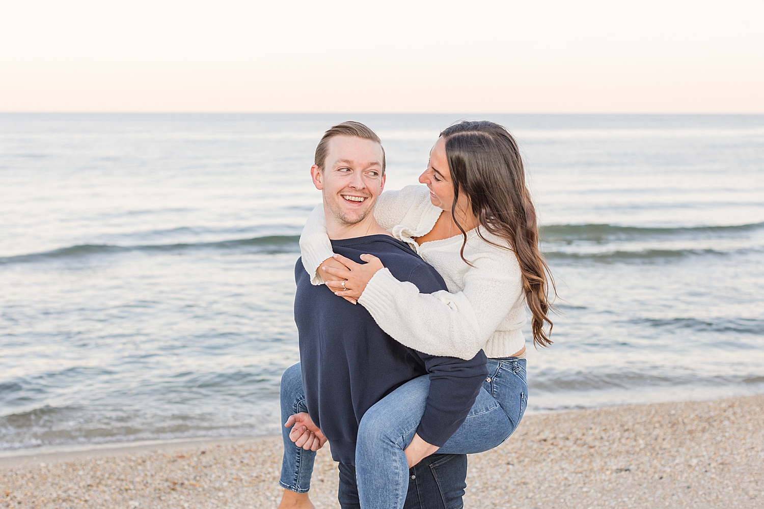 candid beach engagement photos