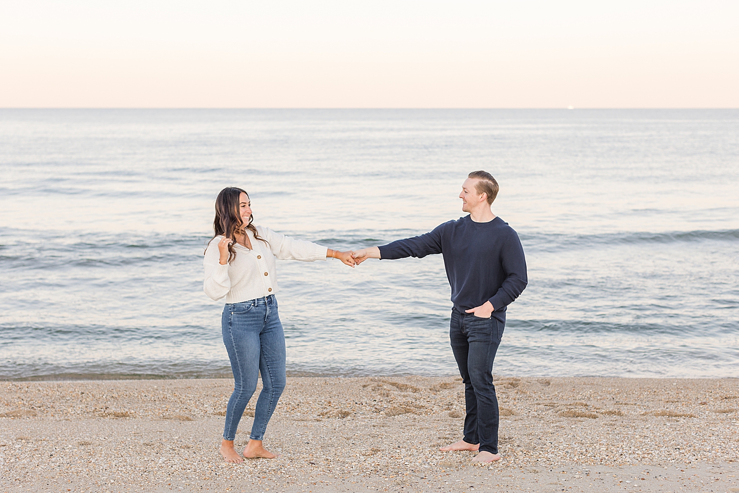 candid beach engagement 