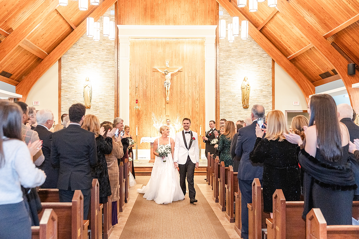 newlyweds exit wedding ceremony