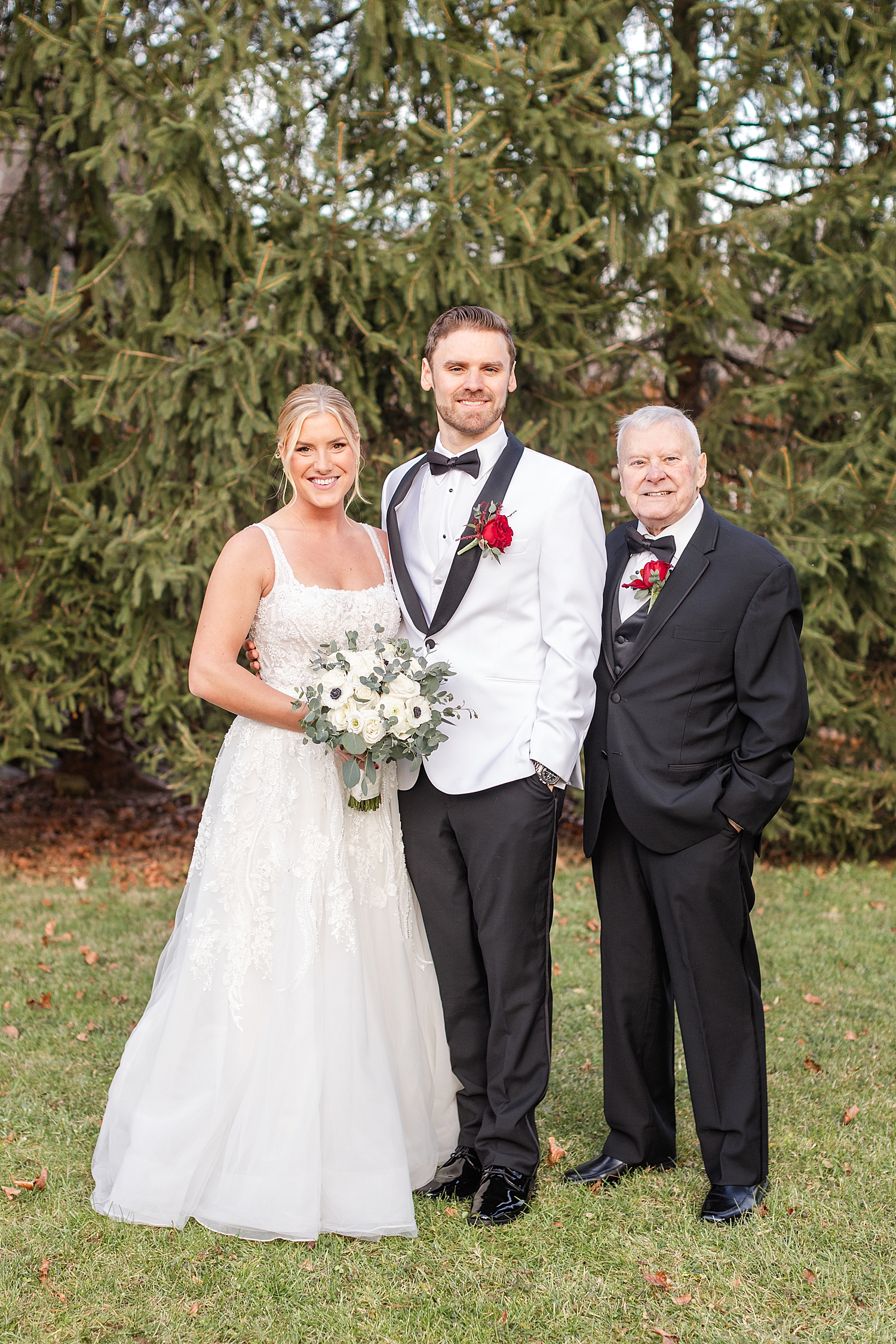 newlyweds with family members