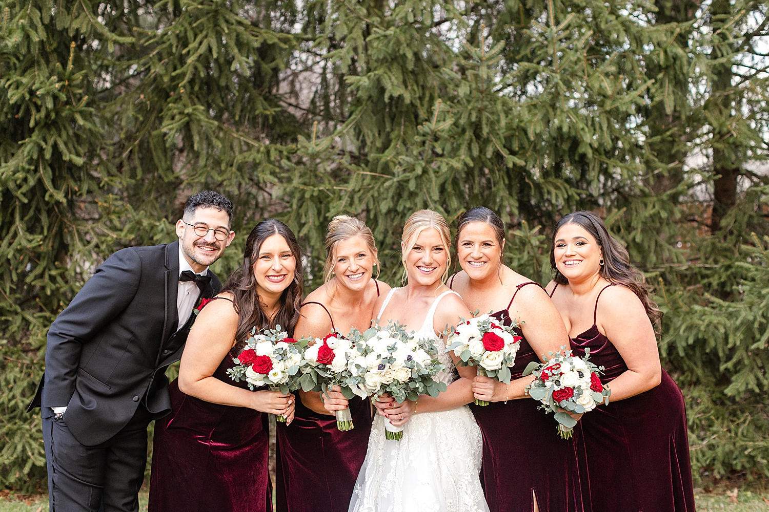 bridesmaids wear burgundy dresses