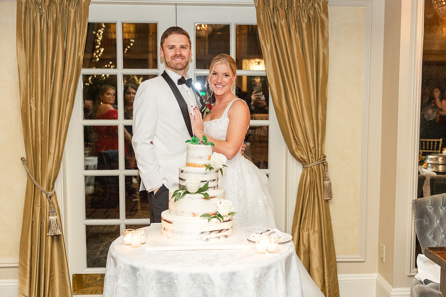 couple with wedding cake