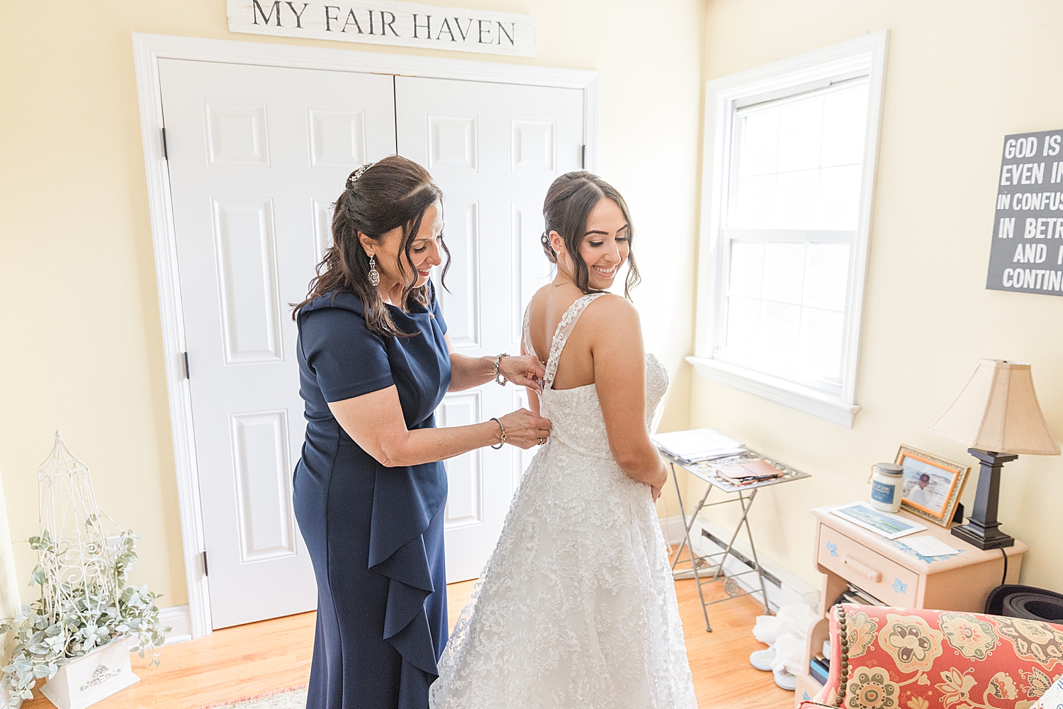 bride gets into dress