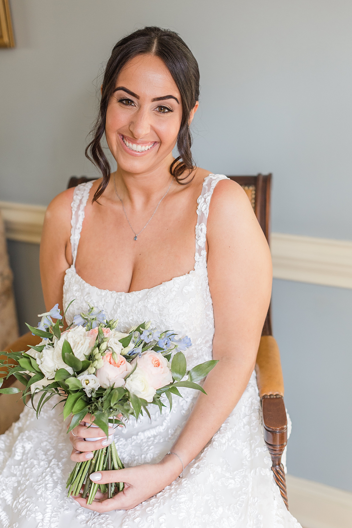 bride holds timeless bridal bouquet from Romantic Spring Wedding in New Jersey