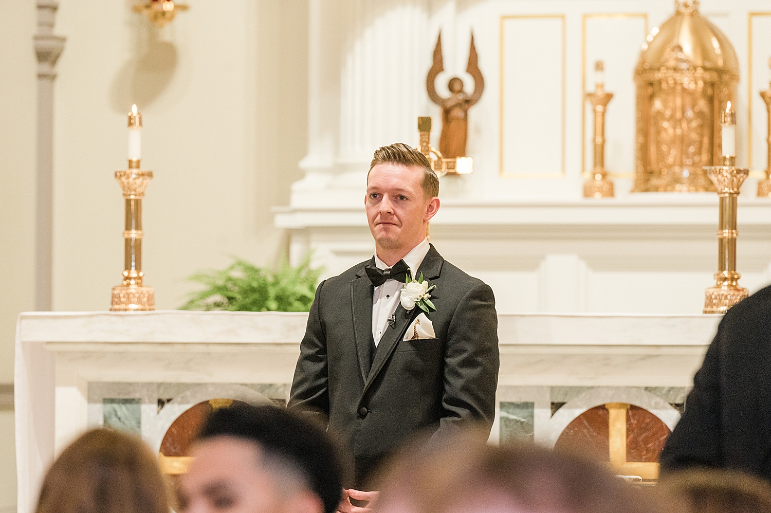 groom sees bride walk down the aisle 