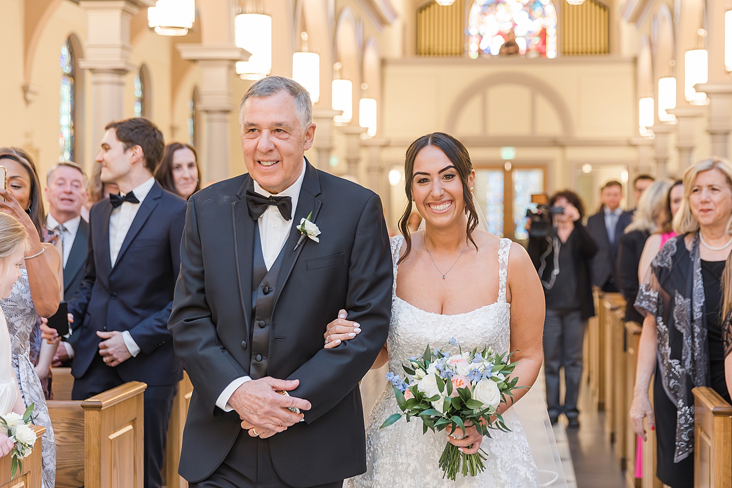 father escorts bride down the asile 