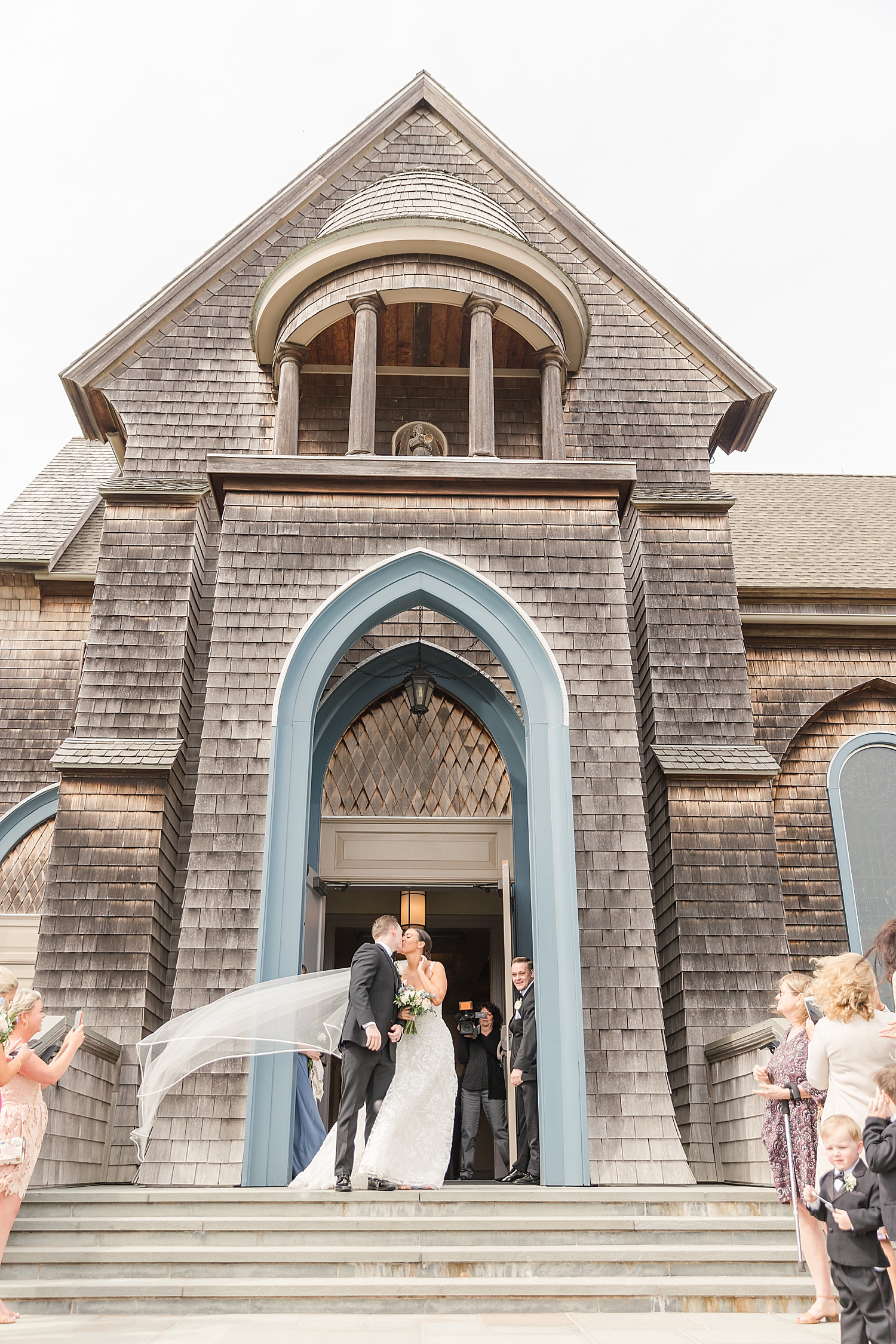 couple exit church from Romantic Spring Wedding in New Jersey